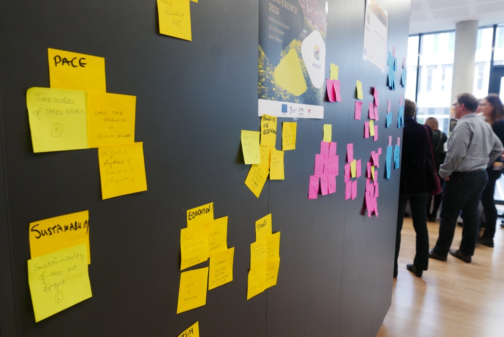 Reflections from conference participants on common themes across the field trip findings., collected on post-it notes.
