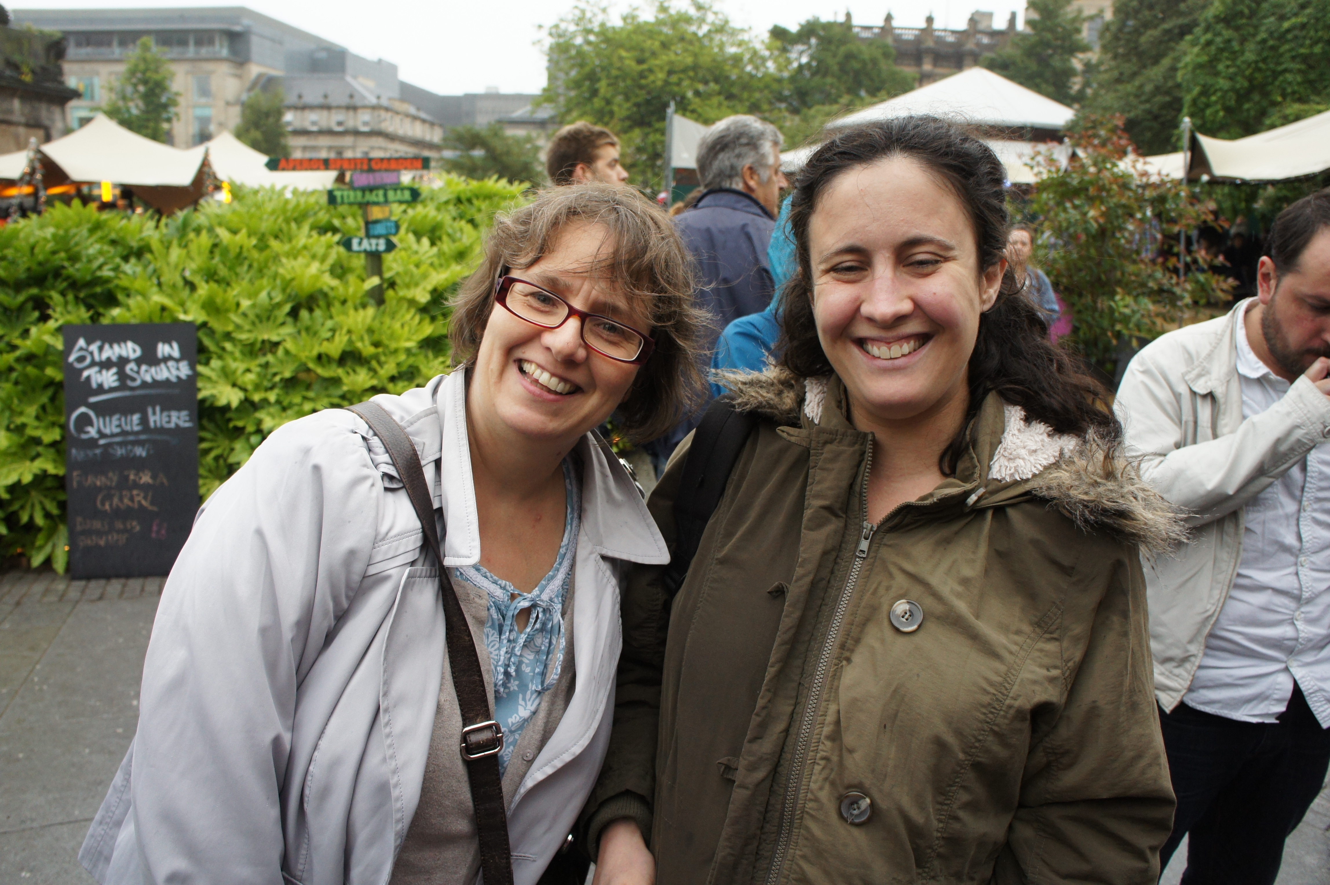 The Beltane Team takes a pause at the busy Edinburgh Fringe Fest. Heather Rea, left, and Sarah Anderson, right.